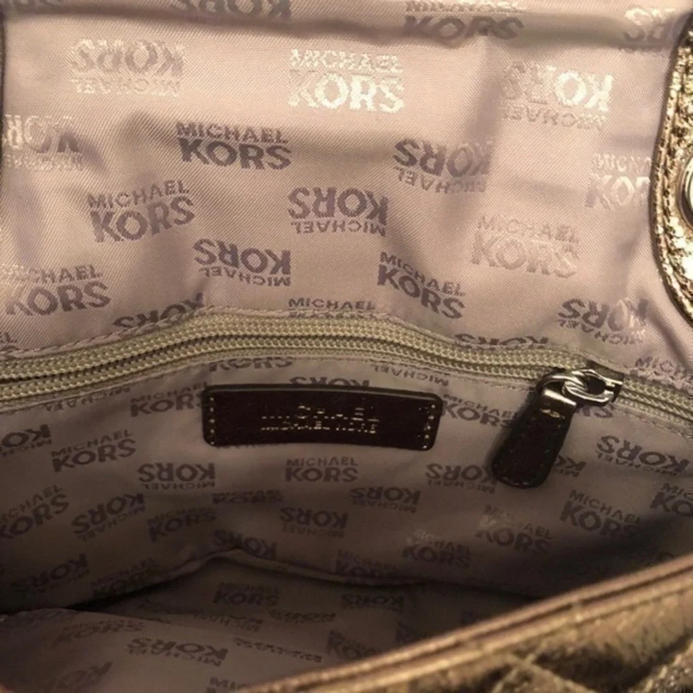 Michael kors metallic bronze quilted bag